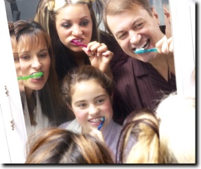 family-brushing-teethweb